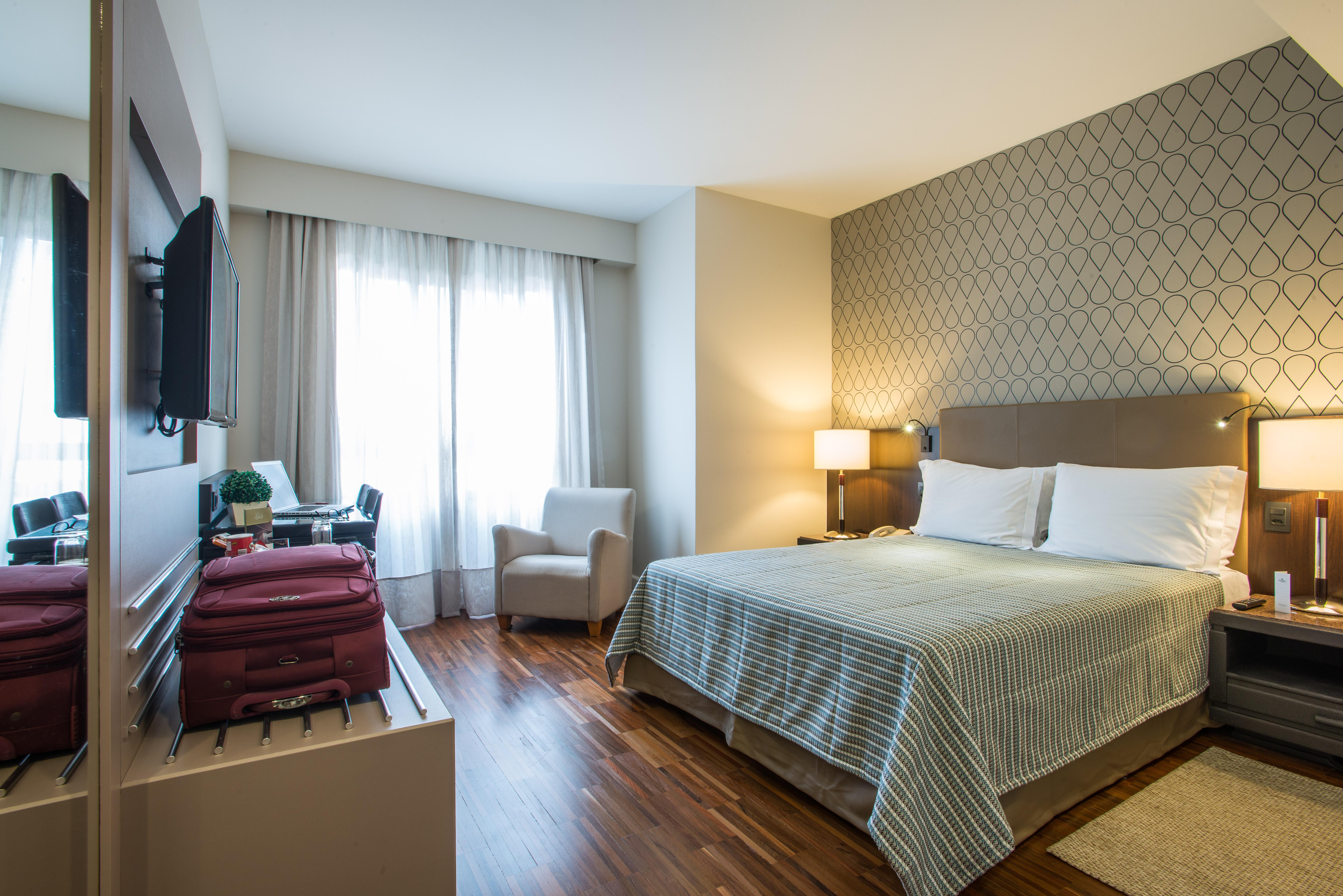Bourbon Hotel & Suites كوريتيبا المظهر الخارجي الصورة A room at the hotel