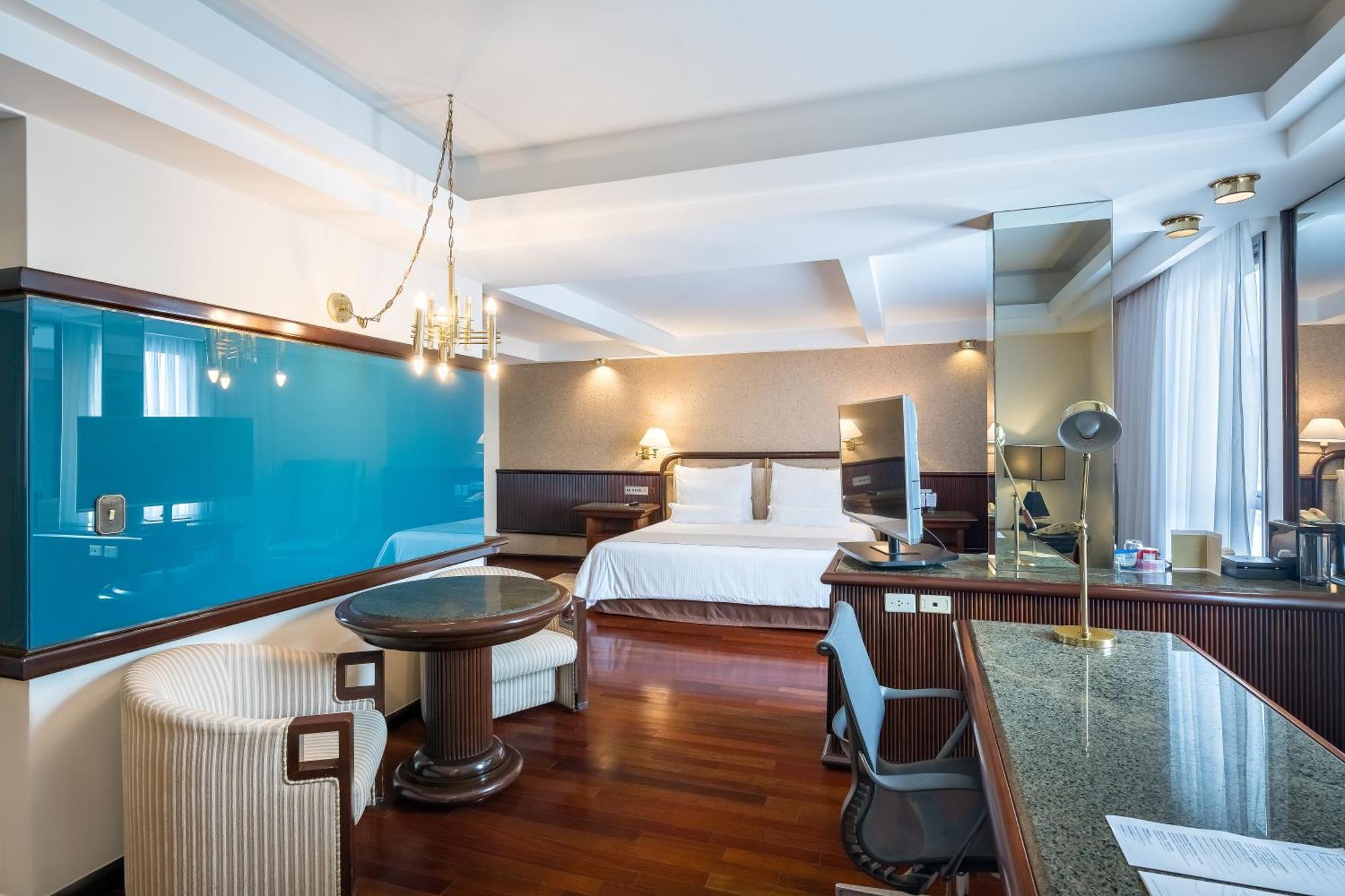 Bourbon Hotel & Suites كوريتيبا المظهر الخارجي الصورة A room at the hotel